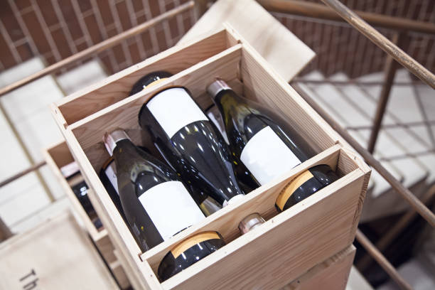 boxes of wine in the store top view boxes of wine in the store top view three bottles of wine in a box for delivering wine for the holidays wine shipping stock pictures, royalty-free photos & images