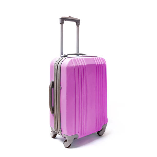 istock Pink plastic handluggage suitacase for travel isolated on white 1177448728
