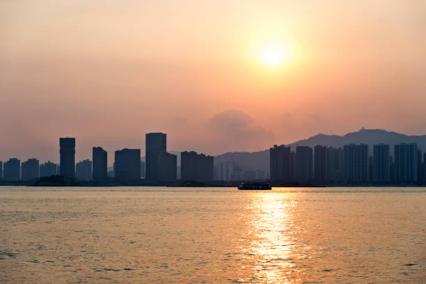 istock City by the sea in sunset 1177448848