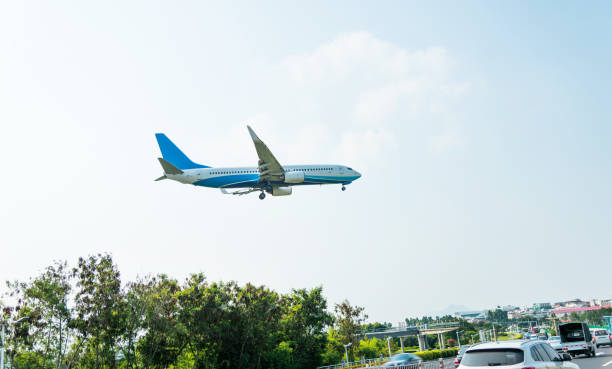 istock Plane flying over the city highway 1177448995