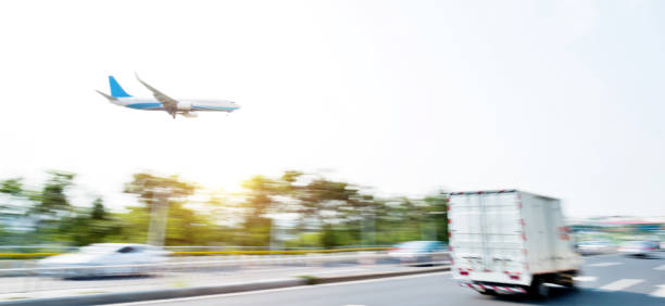 istock Plane flying over the city highway 1177450893