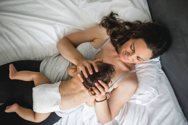 istock Mother and her baby boy, cuddling 1177450911