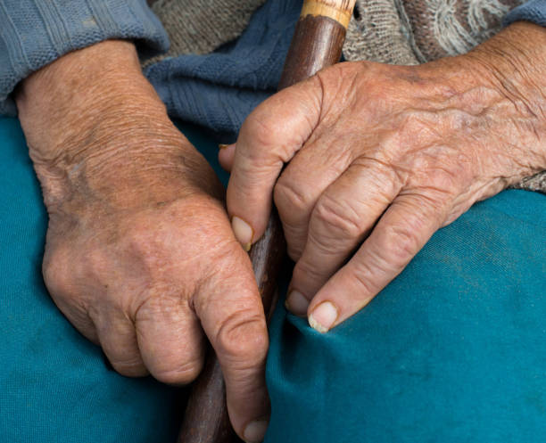 istock Hands of the old peasant woman 1177453338
