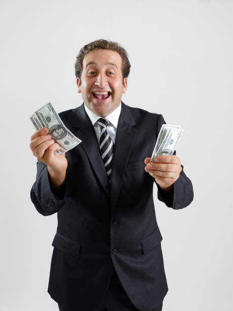 istock businessman with cash 1177454968