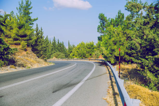 istock Greek Republic. Way and mountains, grass and trees. 13. Sep. 2019 1177456115