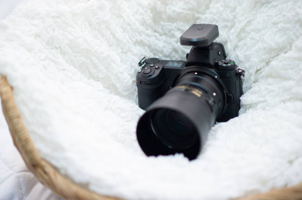 istock The black camera is well placed in a white cloth. 1177461498