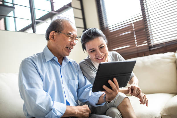 istock Video chatting with their grandchildren 1177464540