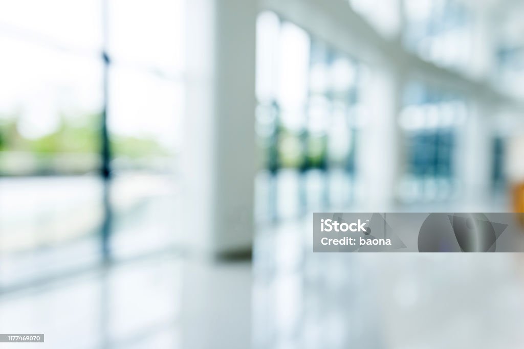 Blur background of empty lobby in hospital Blur background of empty lobby in hospital. Backgrounds Stock Photo