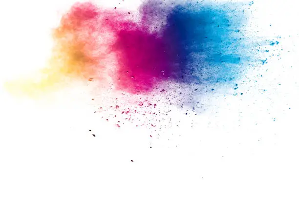Photo of Colorful background of pastel powder explosion.Multi colored dust splash on white background.Painted Holi.