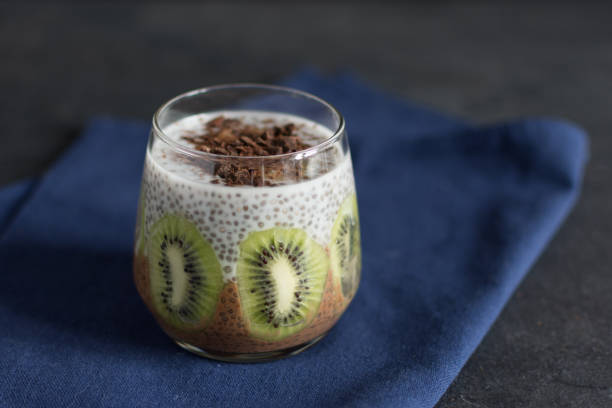 istock Chocolate and vanilla chia seed pudding with kiwi. 1177477890