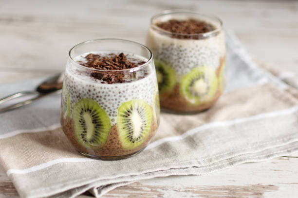 Chocolate and vanilla chia seed pudding with kiwi.