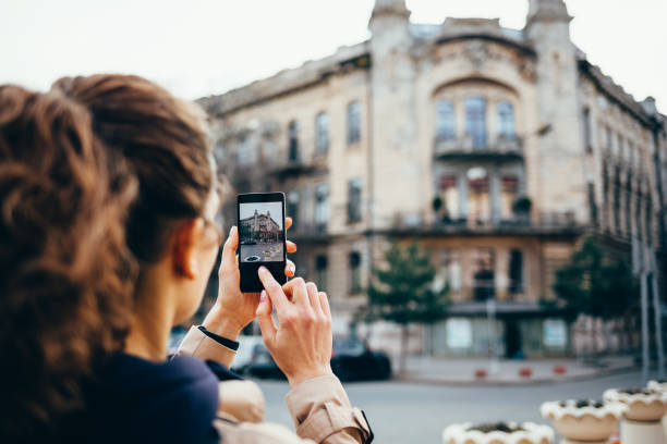 istock Young woman photographed on a mobile phone 1177478043