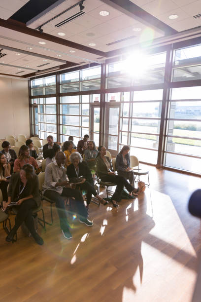 istock High angle view expo audience anticipating first speaker 1177480918
