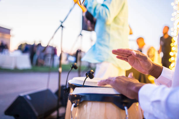 istock Cuban performers playing latino rythms during outdoor party 1177481352