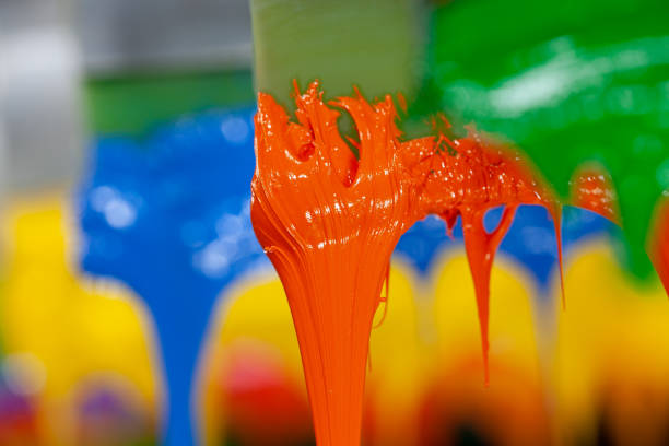 istock focus at orange color are dripping from handle printer 1177481947
