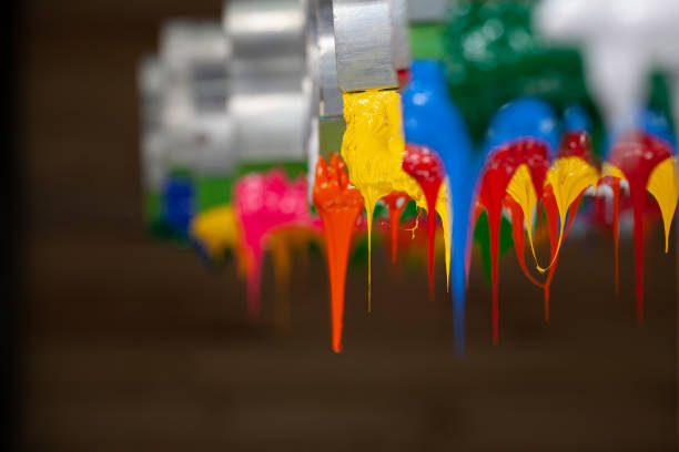 istock focus at yellow color are dripping from handle printer 1177481972