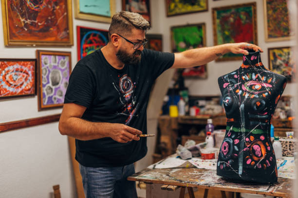 istock Artist painting tailor doll 1177482267