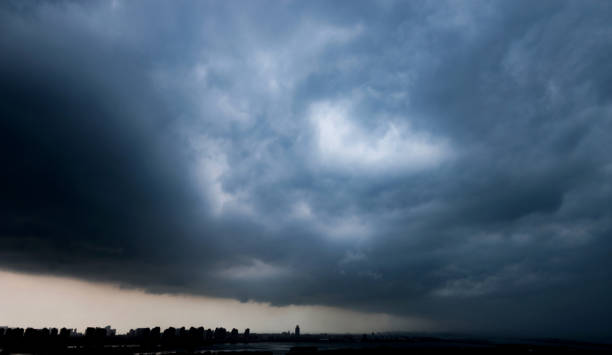 istock Dark storm clouds over the seaside city 1177482457