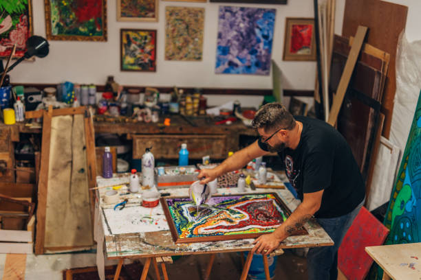 istock Artist painting on canvas 1177482600