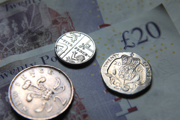 Pound - different british coin on table