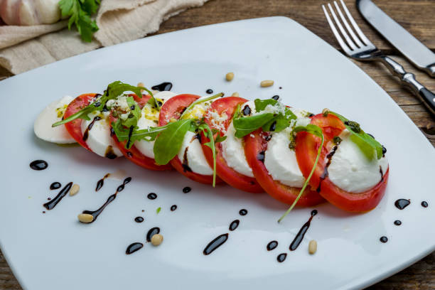 Caprese salad with mozzarella and tomato stock photo