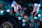 casino-thema-hohe-kontrastbildung-von-casino-roulette-und-pokerchips.jpg?b=1&s=170x170&k=20&c=LpnO8MYy22DX1a22oVHYuxo30_THPW9adbVFqgMzRZE=
