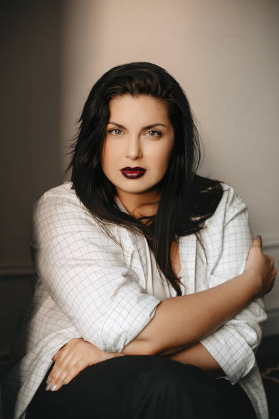 istock Beautiful plus size body positive brunette girl model in studio 1177490714