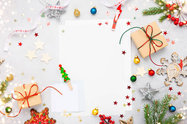 istock Christmas background with gift boxes, festive decor and paper cards notes 1177494952