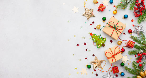istock Christmas background with gift boxes, festive decor, fir tree branches. 1177494963