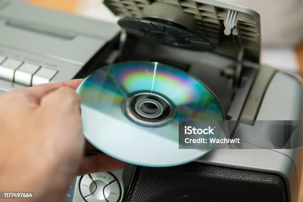 Cd Add Instrument Image Insert Cd Into The Cd Player Stock Photo - Download Image Now - CD ...