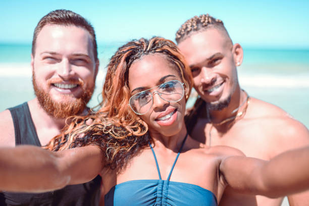 istock Three Races Of People On One Beach 1177501811