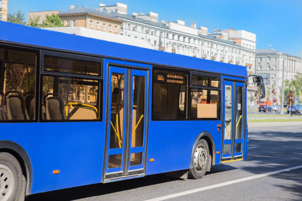 istock bus moving down the street 1177502787