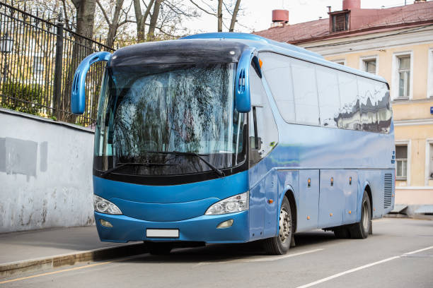 istock bus goes on the street 1177503664