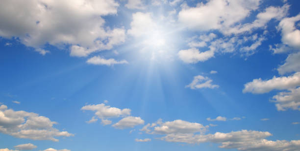 istock Couds in the blue sky. Bright midday sun illuminates the space. 1177503847