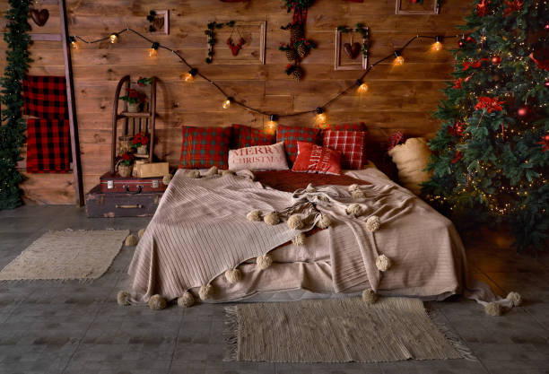 istock bedroom, Christmas decorations, Christmas tree. Magic night with gifts 1177506434