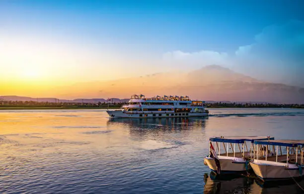 River Nile and ship at sunset in Aswan