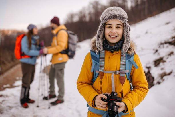 istock Family hiking on snowcapped mountain 1177517340