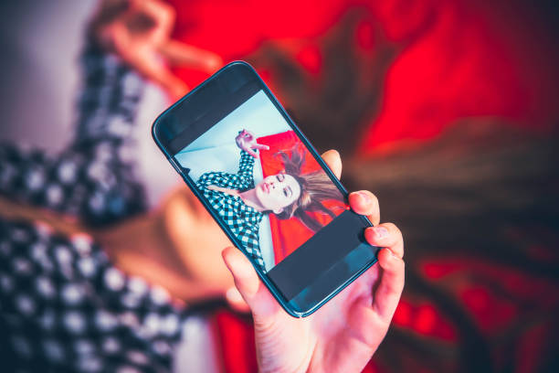 istock Young woman taking selfie 1177521442
