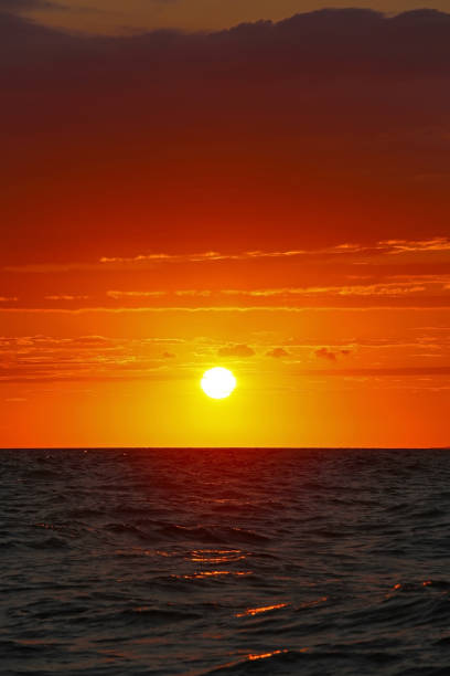 istock sun rise on the sea 1177522440