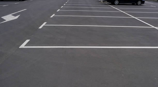istock Empty parking with clear markings and arrows indicating the direction 1177528298