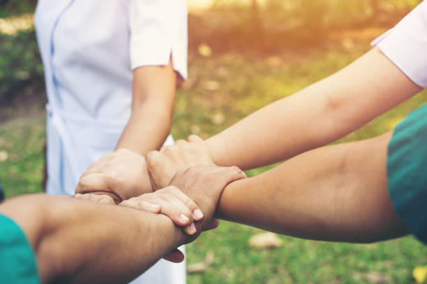 istock together collaborate of hands teamwork in meeting room office 1177540092