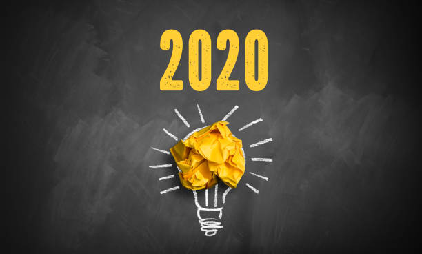 blackboard with message 2020 and crumpled paper symbolizing an idea