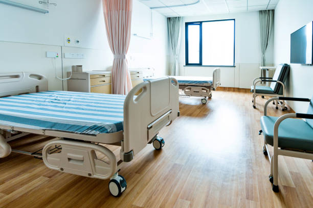 istock Hospital ward with beds and armchairs 1177549369