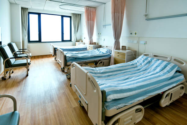 istock Hospital ward with beds and armchairs 1177549378