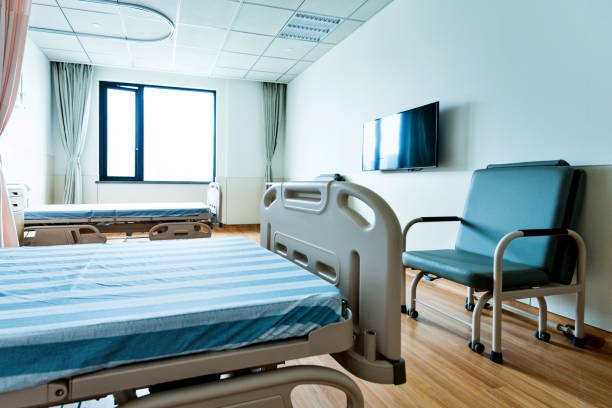istock Hospital ward with beds and armchairs 1177549498