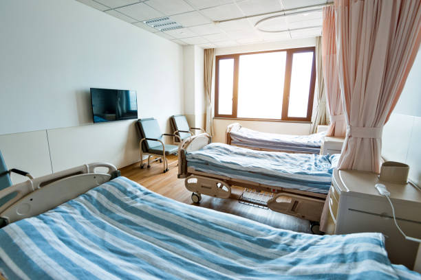 istock Hospital ward with beds and armchairs 1177549517