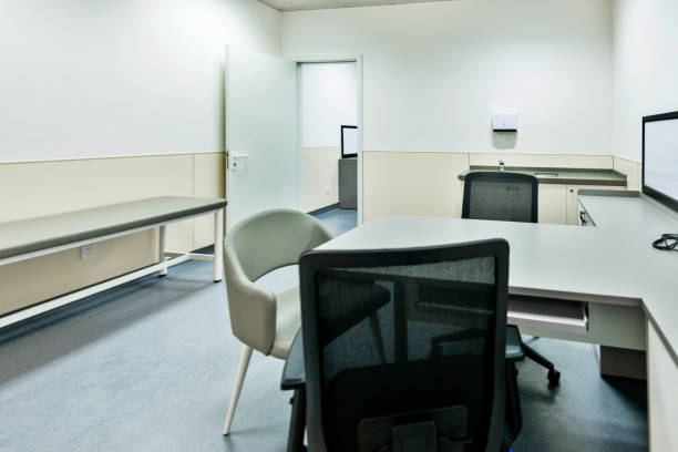 istock Doctor's office with table and chair 1177550330