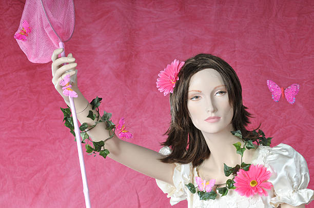 istock Beautiful plastic mannequin hunting butterflies 117755266