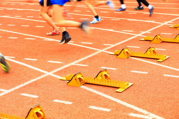 istock sprint start in track and field in blurred motion 1177553863