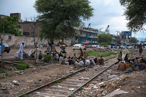 Karkhanai Bazaar, Peshawar/Pakistan-August 11, 2019: Afgan refugees are living at the streets of Karkhanai bazaar (smugglers bazaar), Peshawar, Pakistan